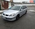Сірий Міцубісі Lancer, об'ємом двигуна 2 л та пробігом 209 тис. км за 5800 $, фото 1 на Automoto.ua
