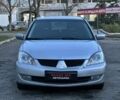 Серый Мицубиси Лансер, объемом двигателя 1.6 л и пробегом 220 тыс. км за 3999 $, фото 3 на Automoto.ua