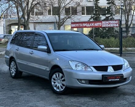 Серый Мицубиси Лансер, объемом двигателя 1.6 л и пробегом 220 тыс. км за 3999 $, фото 5 на Automoto.ua