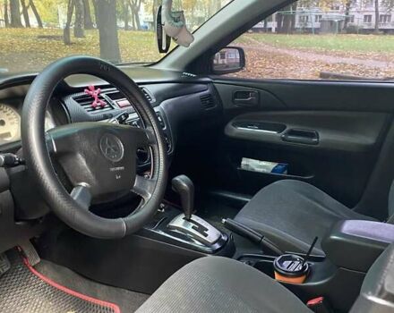 Сірий Міцубісі Lancer, об'ємом двигуна 1.6 л та пробігом 280 тис. км за 4200 $, фото 5 на Automoto.ua