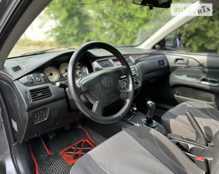 Сірий Міцубісі Lancer, об'ємом двигуна 1.6 л та пробігом 240 тис. км за 4600 $, фото 19 на Automoto.ua