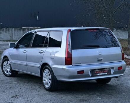 Серый Мицубиси Лансер, объемом двигателя 1.6 л и пробегом 220 тыс. км за 3999 $, фото 4 на Automoto.ua