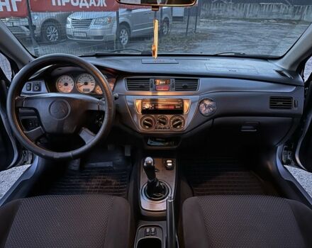 Серый Мицубиси Лансер, объемом двигателя 1.6 л и пробегом 220 тыс. км за 3999 $, фото 12 на Automoto.ua