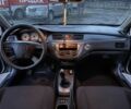 Серый Мицубиси Лансер, объемом двигателя 1.6 л и пробегом 220 тыс. км за 3999 $, фото 12 на Automoto.ua