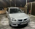 Сірий Міцубісі Lancer, об'ємом двигуна 1.6 л та пробігом 396 тис. км за 3250 $, фото 1 на Automoto.ua