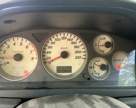 Сірий Міцубісі Lancer, об'ємом двигуна 1.6 л та пробігом 278 тис. км за 4600 $, фото 7 на Automoto.ua