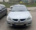 Сірий Міцубісі Lancer, об'ємом двигуна 1.6 л та пробігом 396 тис. км за 2900 $, фото 1 на Automoto.ua