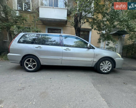 Серый Мицубиси Лансер, объемом двигателя 1.58 л и пробегом 278 тыс. км за 4700 $, фото 3 на Automoto.ua