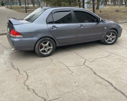 Сірий Міцубісі Lancer, об'ємом двигуна 1.6 л та пробігом 280 тис. км за 4200 $, фото 2 на Automoto.ua