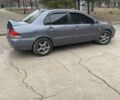 Сірий Міцубісі Lancer, об'ємом двигуна 1.6 л та пробігом 280 тис. км за 4200 $, фото 2 на Automoto.ua