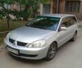 Серый Мицубиси Лансер, объемом двигателя 1.6 л и пробегом 350 тыс. км за 3500 $, фото 6 на Automoto.ua