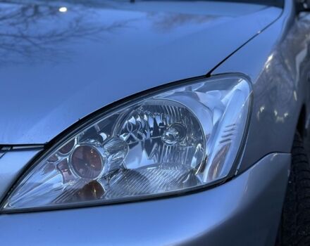 Серый Мицубиси Лансер, объемом двигателя 1.6 л и пробегом 220 тыс. км за 3999 $, фото 19 на Automoto.ua