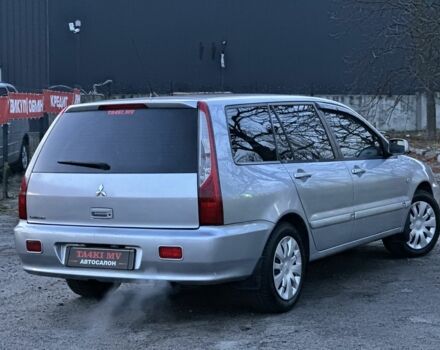 Серый Мицубиси Лансер, объемом двигателя 1.6 л и пробегом 220 тыс. км за 3999 $, фото 1 на Automoto.ua