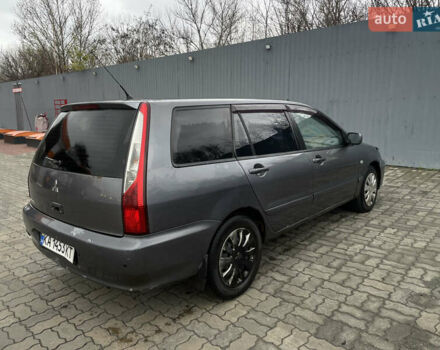 Серый Мицубиси Лансер, объемом двигателя 1.6 л и пробегом 667 тыс. км за 2999 $, фото 4 на Automoto.ua