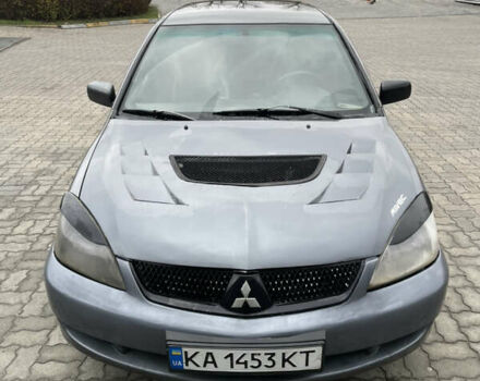 Серый Мицубиси Лансер, объемом двигателя 1.6 л и пробегом 667 тыс. км за 2999 $, фото 2 на Automoto.ua