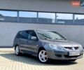Серый Мицубиси Лансер, объемом двигателя 1.58 л и пробегом 138 тыс. км за 4000 $, фото 1 на Automoto.ua