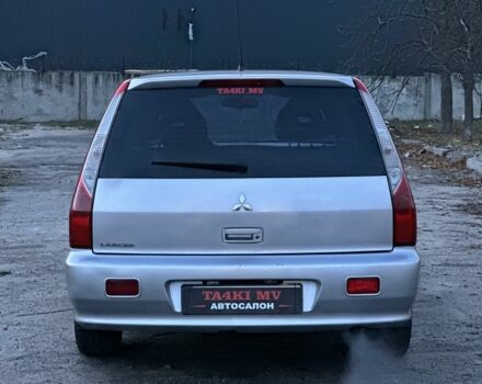 Серый Мицубиси Лансер, объемом двигателя 1.6 л и пробегом 220 тыс. км за 3999 $, фото 2 на Automoto.ua