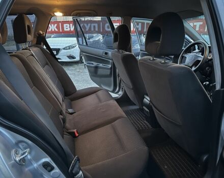 Серый Мицубиси Лансер, объемом двигателя 1.6 л и пробегом 220 тыс. км за 3999 $, фото 9 на Automoto.ua