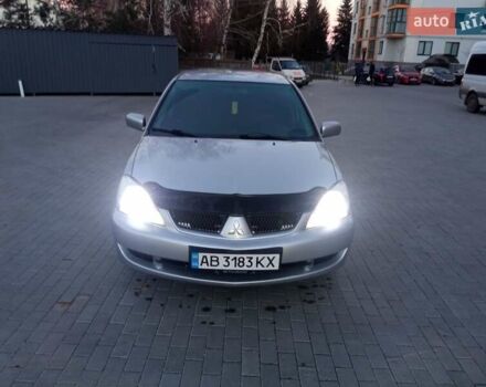 Сірий Міцубісі Lancer, об'ємом двигуна 1.58 л та пробігом 258 тис. км за 2999 $, фото 8 на Automoto.ua