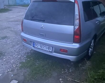 Серый Мицубиси Лансер, объемом двигателя 2 л и пробегом 250 тыс. км за 4058 $, фото 6 на Automoto.ua