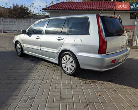 Сірий Міцубісі Lancer, об'ємом двигуна 1.58 л та пробігом 220 тис. км за 4499 $, фото 18 на Automoto.ua