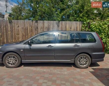 Сірий Міцубісі Lancer, об'ємом двигуна 1.6 л та пробігом 279 тис. км за 5800 $, фото 32 на Automoto.ua