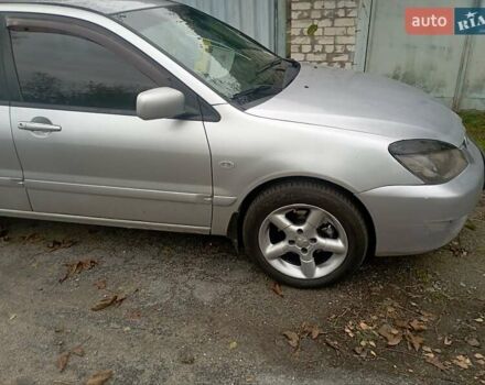 Серый Мицубиси Лансер, объемом двигателя 1.6 л и пробегом 350 тыс. км за 2700 $, фото 8 на Automoto.ua