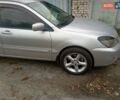 Сірий Міцубісі Lancer, об'ємом двигуна 1.6 л та пробігом 350 тис. км за 4000 $, фото 8 на Automoto.ua