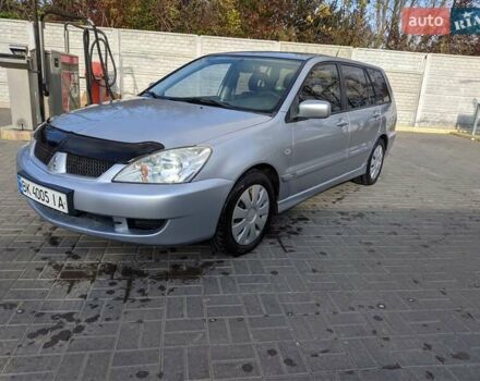 Сірий Міцубісі Lancer, об'ємом двигуна 1.58 л та пробігом 220 тис. км за 4499 $, фото 3 на Automoto.ua