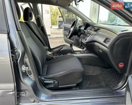 Сірий Міцубісі Lancer, об'ємом двигуна 1.59 л та пробігом 279 тис. км за 4999 $, фото 35 на Automoto.ua