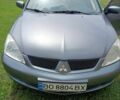Сірий Міцубісі Lancer, об'ємом двигуна 1.6 л та пробігом 194 тис. км за 3090 $, фото 1 на Automoto.ua