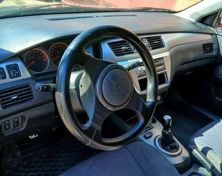 Сірий Міцубісі Lancer, об'ємом двигуна 2 л та пробігом 267 тис. км за 4350 $, фото 4 на Automoto.ua