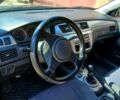 Сірий Міцубісі Lancer, об'ємом двигуна 2 л та пробігом 267 тис. км за 4350 $, фото 4 на Automoto.ua