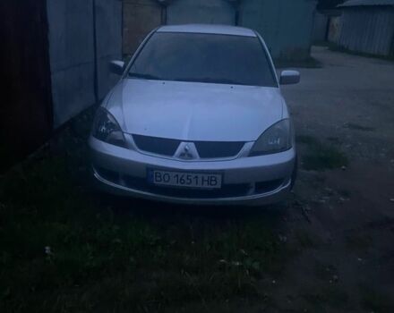 Серый Мицубиси Лансер, объемом двигателя 2 л и пробегом 250 тыс. км за 4058 $, фото 3 на Automoto.ua