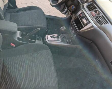 Сірий Міцубісі Lancer, об'ємом двигуна 1.58 л та пробігом 220 тис. км за 4499 $, фото 32 на Automoto.ua