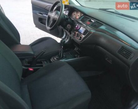 Сірий Міцубісі Lancer, об'ємом двигуна 1.58 л та пробігом 258 тис. км за 2999 $, фото 18 на Automoto.ua