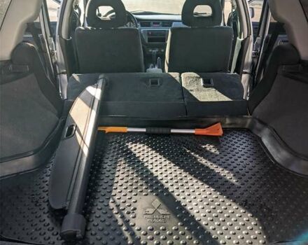 Сірий Міцубісі Lancer, об'ємом двигуна 1.58 л та пробігом 220 тис. км за 4499 $, фото 39 на Automoto.ua