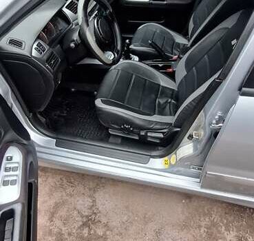 Серый Мицубиси Лансер, объемом двигателя 1.58 л и пробегом 223 тыс. км за 3200 $, фото 4 на Automoto.ua