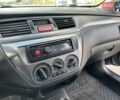 Сірий Міцубісі Lancer, об'ємом двигуна 1.59 л та пробігом 279 тис. км за 4999 $, фото 28 на Automoto.ua