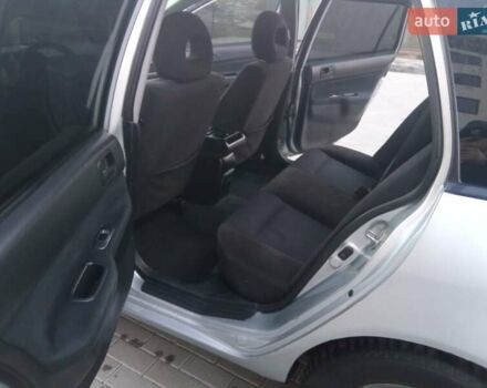 Сірий Міцубісі Lancer, об'ємом двигуна 1.58 л та пробігом 258 тис. км за 2999 $, фото 19 на Automoto.ua