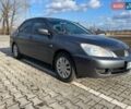 Серый Мицубиси Лансер, объемом двигателя 1.6 л и пробегом 255 тыс. км за 4500 $, фото 2 на Automoto.ua