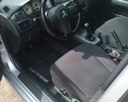 Сірий Міцубісі Lancer, об'ємом двигуна 1.6 л та пробігом 240 тис. км за 5000 $, фото 6 на Automoto.ua