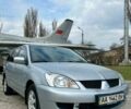 Сірий Міцубісі Lancer, об'ємом двигуна 1.6 л та пробігом 350 тис. км за 3100 $, фото 1 на Automoto.ua