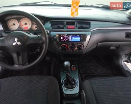 Сірий Міцубісі Lancer, об'ємом двигуна 1.58 л та пробігом 258 тис. км за 2999 $, фото 12 на Automoto.ua