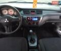 Сірий Міцубісі Lancer, об'ємом двигуна 1.58 л та пробігом 258 тис. км за 2999 $, фото 12 на Automoto.ua
