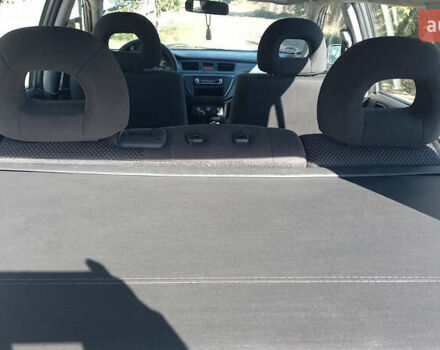 Серый Мицубиси Лансер, объемом двигателя 1.58 л и пробегом 296 тыс. км за 3850 $, фото 6 на Automoto.ua