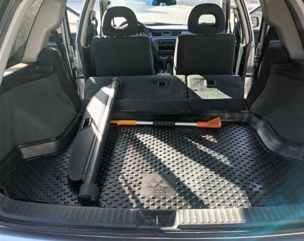 Сірий Міцубісі Lancer, об'ємом двигуна 1.58 л та пробігом 220 тис. км за 4499 $, фото 38 на Automoto.ua