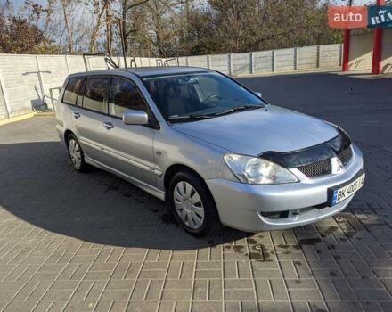 Сірий Міцубісі Lancer, об'ємом двигуна 1.58 л та пробігом 220 тис. км за 4499 $, фото 10 на Automoto.ua