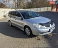 Сірий Міцубісі Lancer, об'ємом двигуна 1.58 л та пробігом 220 тис. км за 4499 $, фото 10 на Automoto.ua