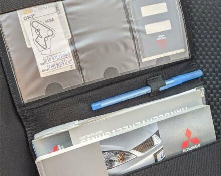 Сірий Міцубісі Lancer, об'ємом двигуна 1.58 л та пробігом 220 тис. км за 4499 $, фото 49 на Automoto.ua